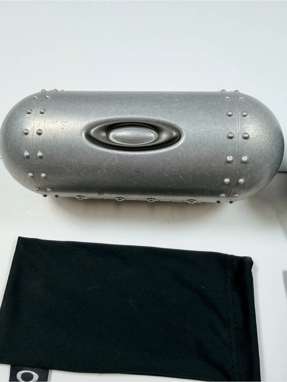 Oakley Black & Silver Hard Cases with Seven Black Microfiber Pouches